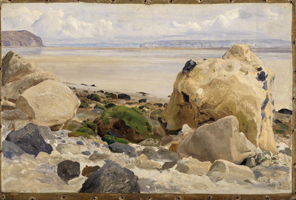 Steiniger Strand von Johann Wilhelm Schirmer zeigt eine raue Küstenlandschaft. Das Meer ist unruhig mit Wellen, die gegen die Steine schlagen,