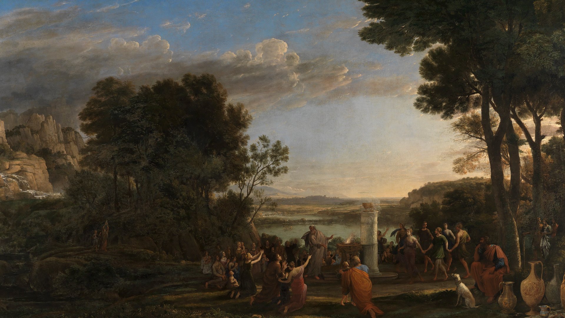 Detail des Werks Die Anbetung des Goldenen Kalbes von Claude Lorrain. In einer Landschaft mit Wäldern, Hügeln und einem See gruppieren sich Personen um eine Steele. .