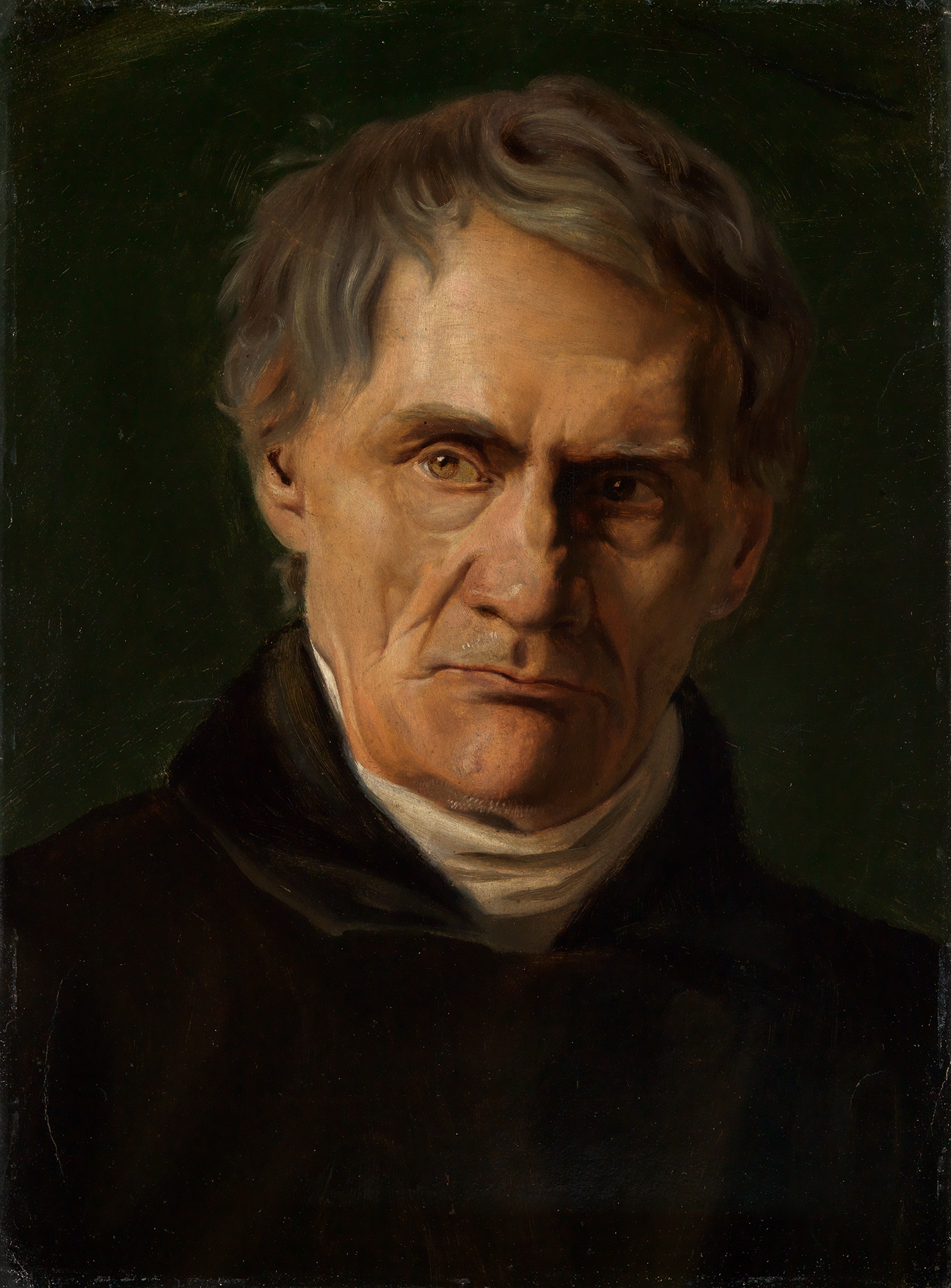 Feuerbachs Porträt eines älteren Herrn. Der Hintergrund und Vordergrund ist sehr dunkel.