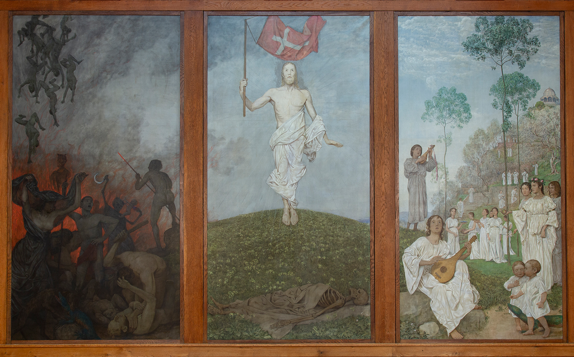 Das dreiteilige Kunstwerk von Hans Thoma zeigt sowohl die Hölle, Jeus sowie die Seligen.