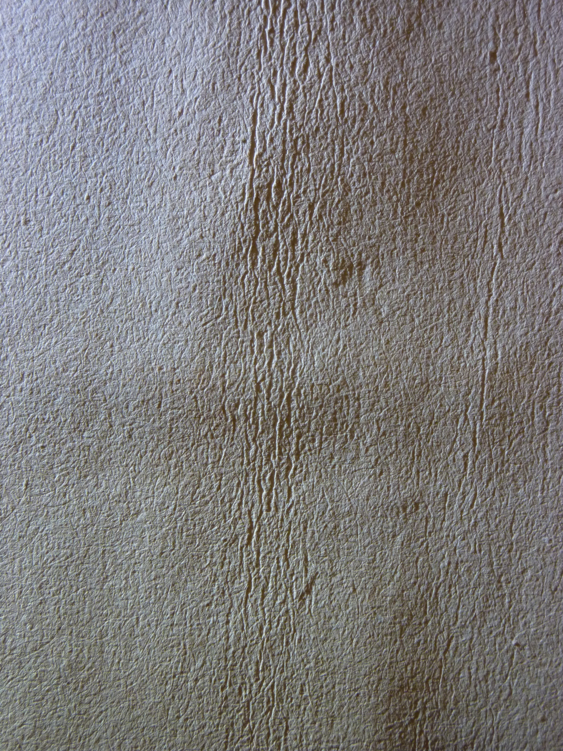 Das Bild zeigt Trocknungsfalten auf einem Blatt Papier