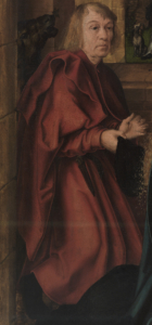 Der Detailausschnitt des Gemäldes "Anbetung des Kindes" legt den Fokus auf Josef. Er trägt einen roten Mantel.