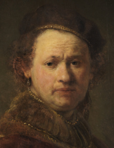 Portrait of a man with a hat and an earring.