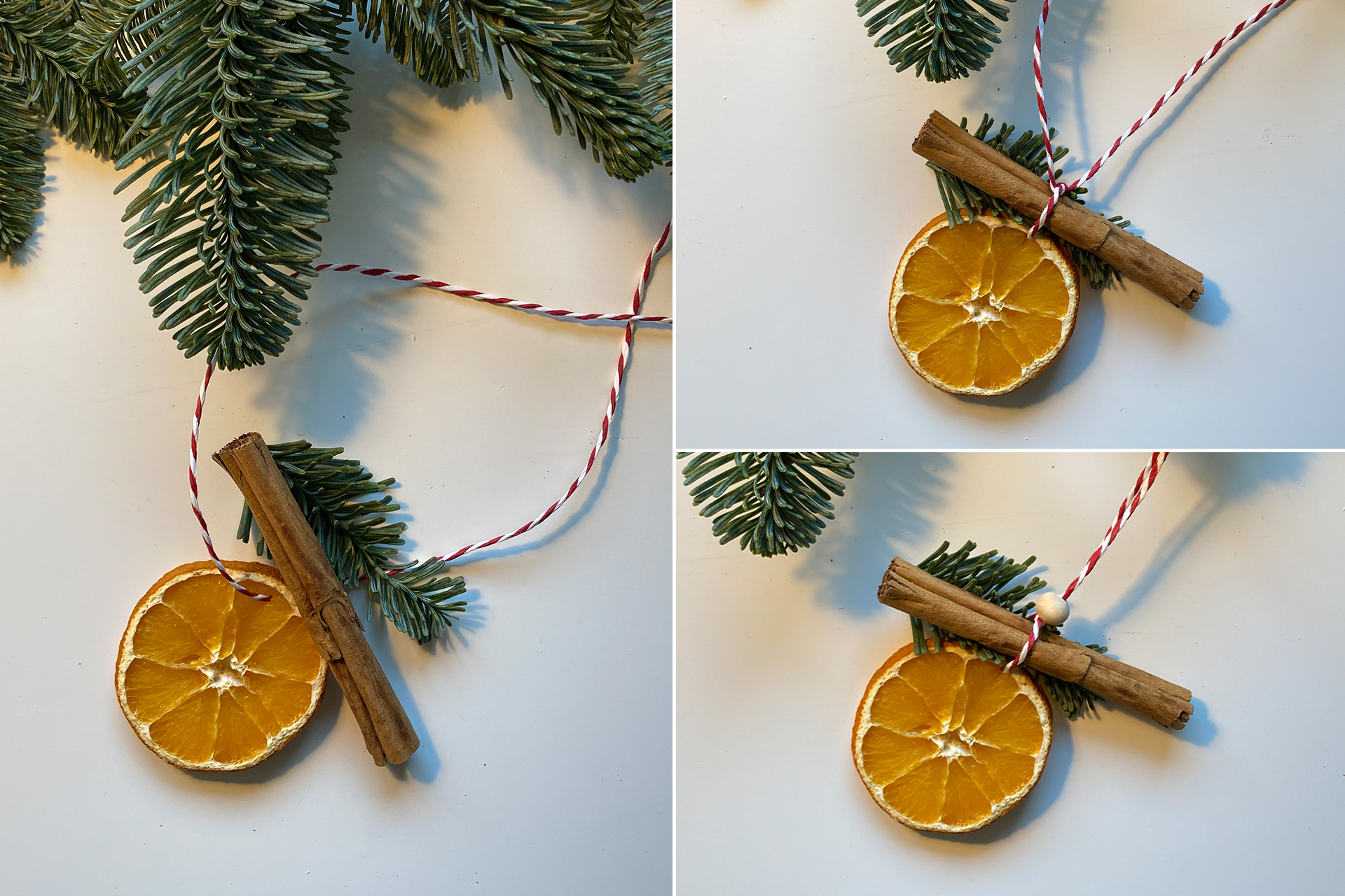 Dekoration einer getrockneten Orangenscheibe mit Zimtstange, Tannenzweig und Holzperle.