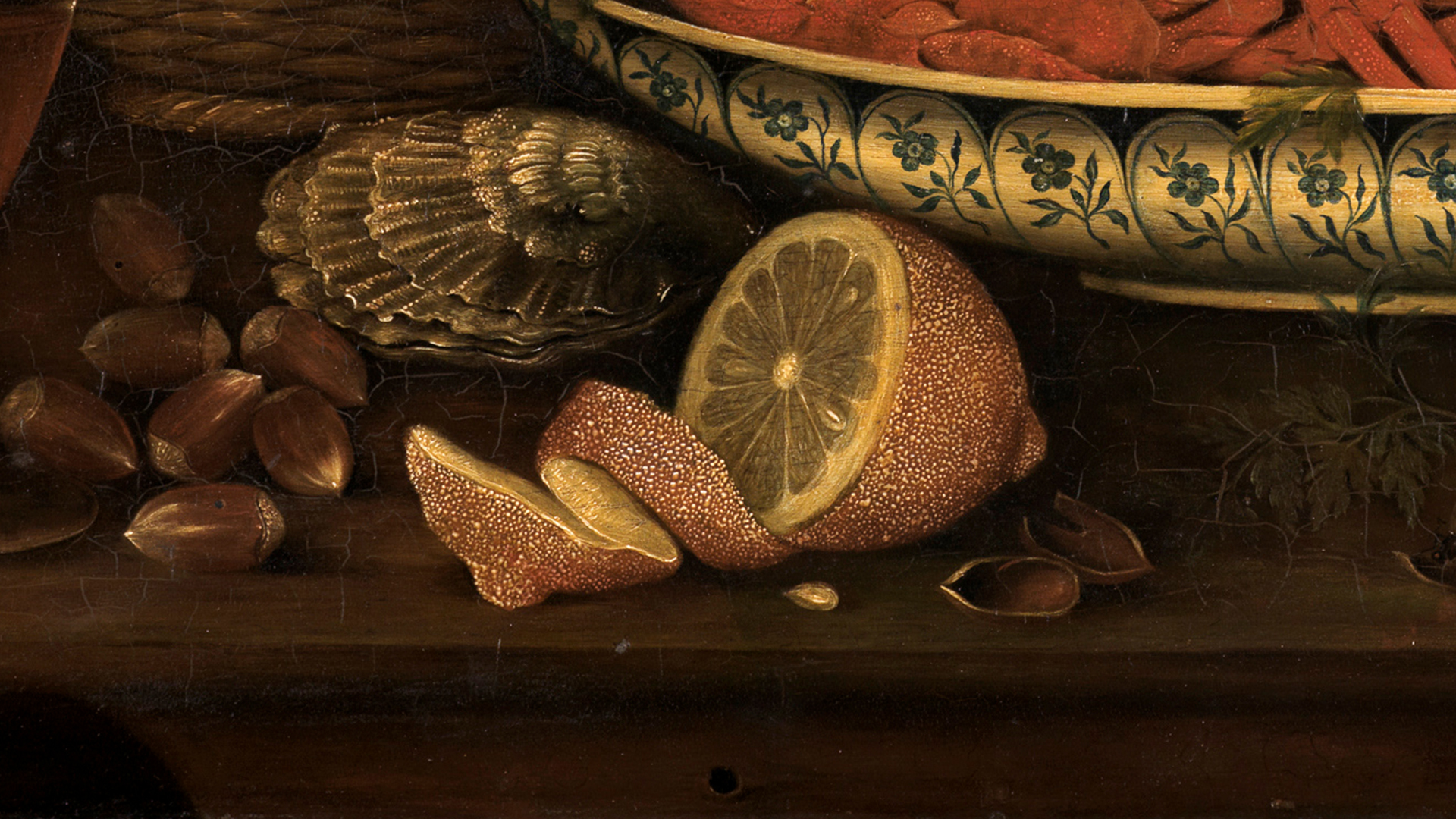 Ausschnitt aus dem Gemälde Frühstücksstillleben mit gesottenem Hummer. Auf der Detailansicht ist eine aufgeschnittene Zitrone, eine Muschel und Eicheln zu erkennen.