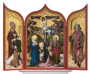 Das mittelalterliche Kunstwerk Haiders ist ein Triptychon. Es besteht aus drei Teilen. In der Mitte ist die Kreuzigung Christi dargestellt.