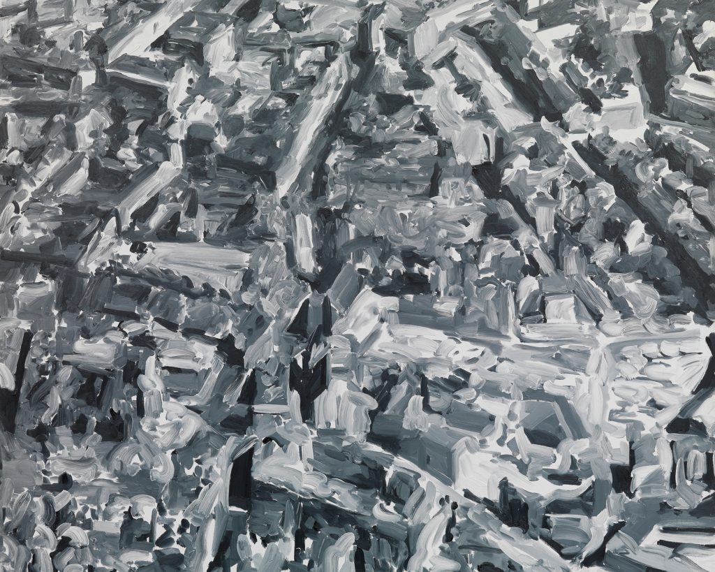 The work of art by the contemporary artist Gerhard Richter shows the abstract depiction of a city from a bird's eye view. The picture is painted in black and white colors.