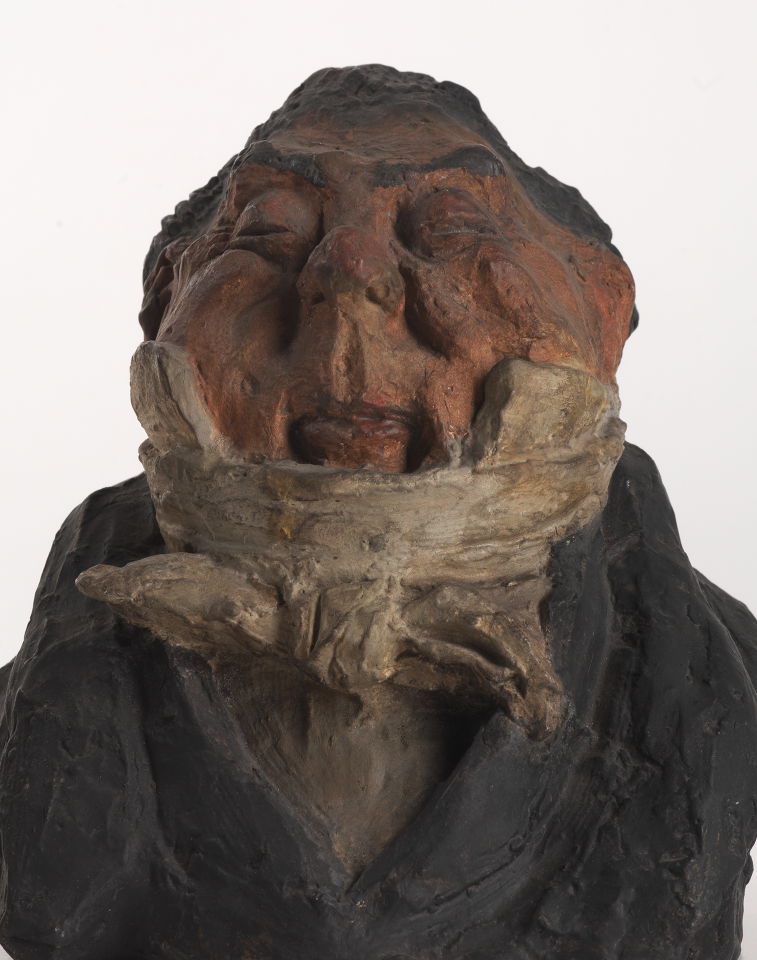 Bemalte Tonbüste von Honoré Daumier: Charles-Guillaume Etienne, pausbackig und mit geschlossenen Augen, im weißen Kragen und Schal eingesunken.