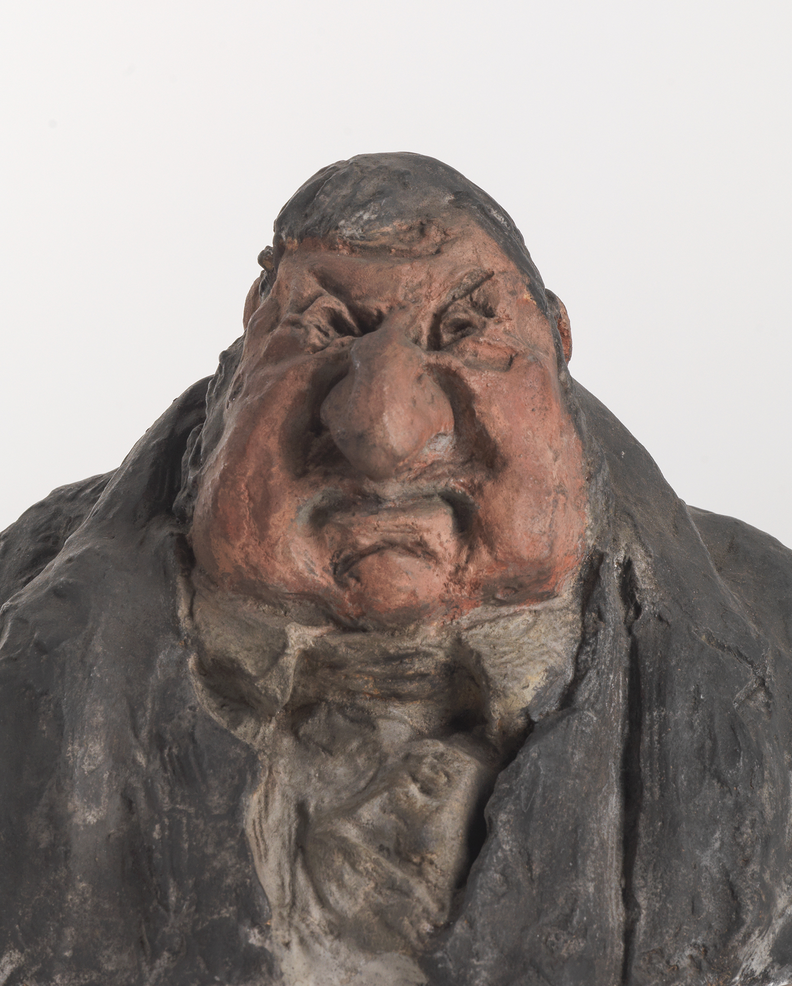 Bemalte Tonbüste von Honoré Daumier: Jean-Marie Fruchard, mit birnenförmigem Kopf, verkniffenem Mund, riesiger Nase und winzigen Augen.
